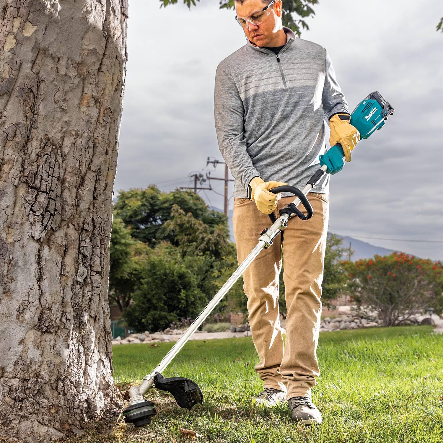Makita XUX02SM1X5 18V LXT® Brushless Couple Shaft Power Head Kit w/String Trimmer, Pole Saw & Articulating Hedge Trimmer Attachments (4.0Ah) - Image 25